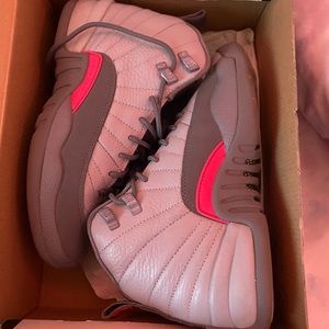 Air Jordan 12s in grey and pink
